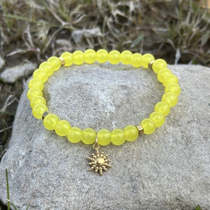 Bracelet with jade and sun charm
