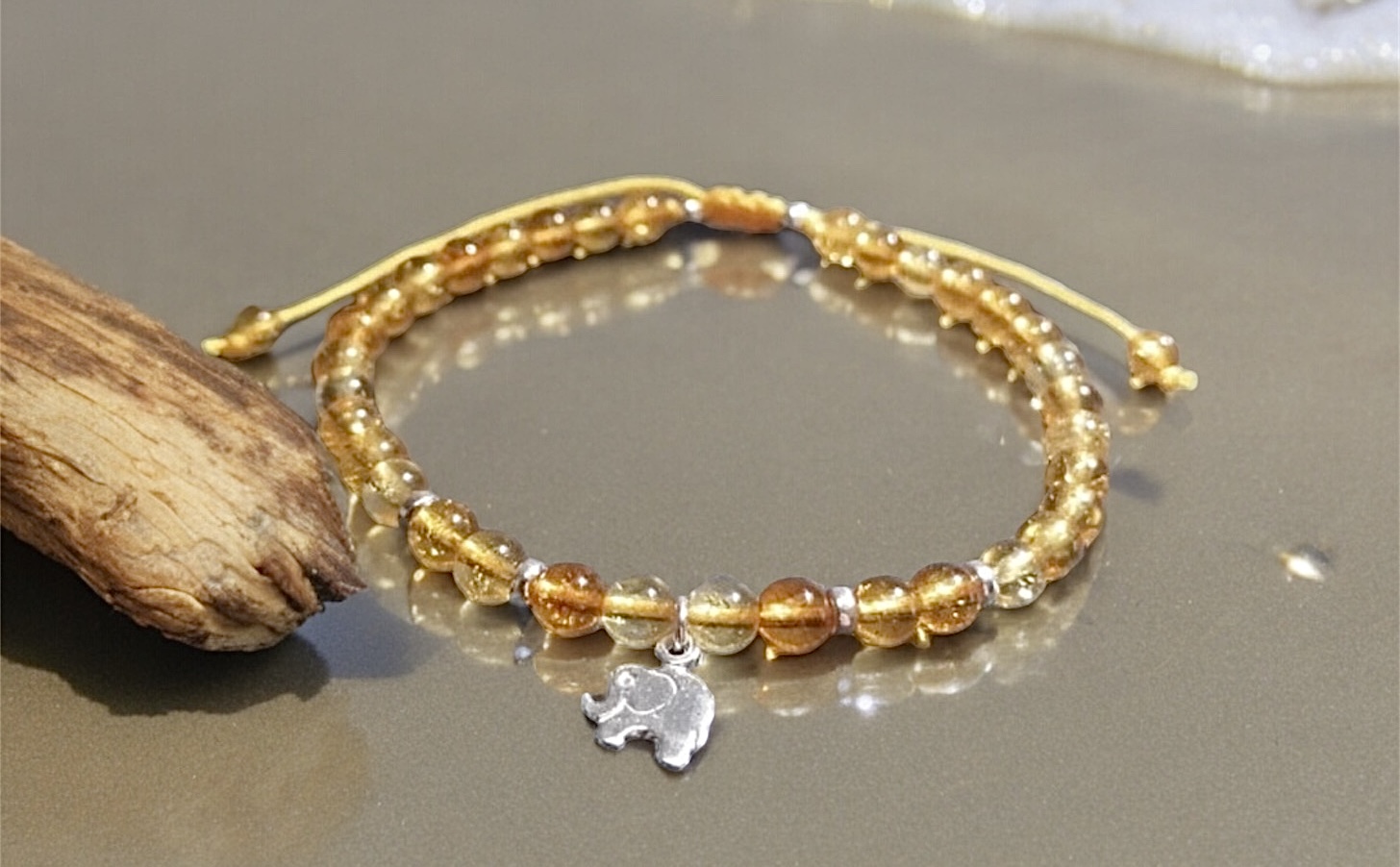 Citrine bracelet with sterling silver elephant